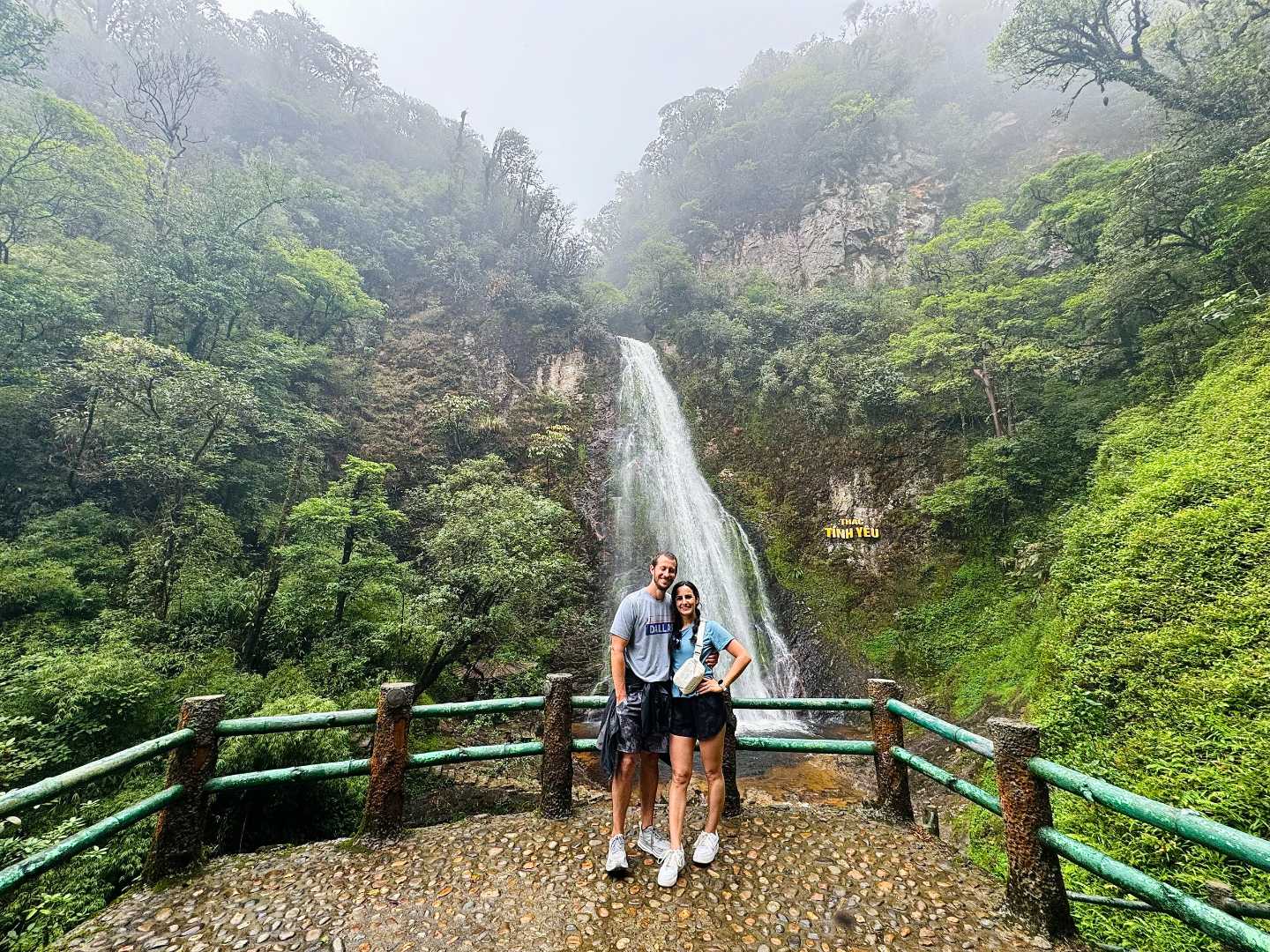 a couple in Love waterfall